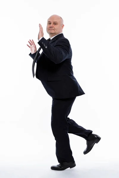 Bald Middle Aged Man Strict Black Suit Jumps Funny Business — Stock Photo, Image