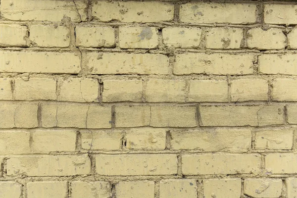 肮脏的黄色砖墙的纹理 案文的篇幅 — 图库照片