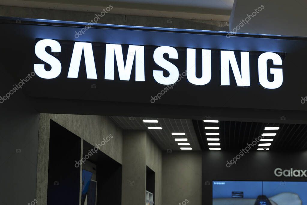 Samsung sign at the service center and the sales office of equipment. Close-up. Moscow, Russia, 07-21-2021.