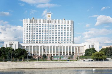 The House of the Government of the Russian Federation on the embankment in the center of the capital on a sunny clear day. Front view. Moscow, Russia, 07-25-2021.
