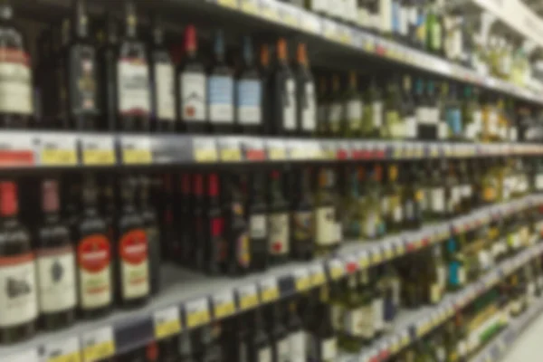 Assorted Alcohol Shelves Store Various Wines Side View Blurred — Stock Photo, Image