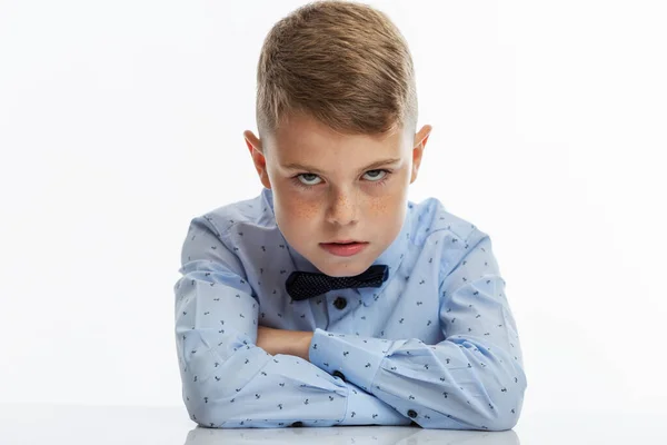 Angry Boy Years Old Sits Table Child Blue Shirt Bow — Stock Photo, Image