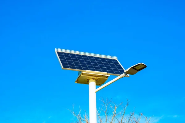 A street lamp with solar panel. Clean energy. Solar energy in the city. Modern city background.