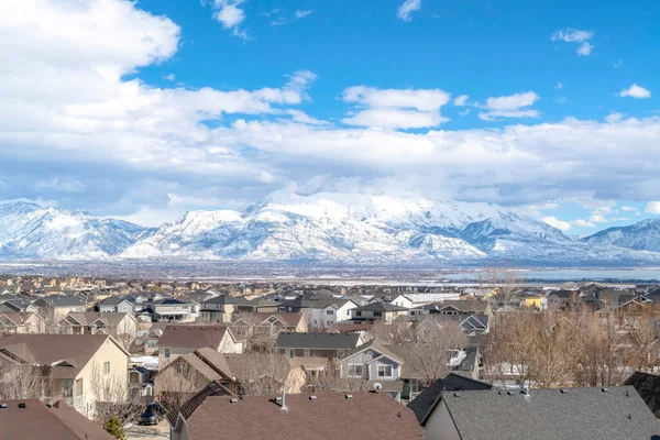 Utah Valley in winter setting with houses overlooking lake and Wasatch Mountain