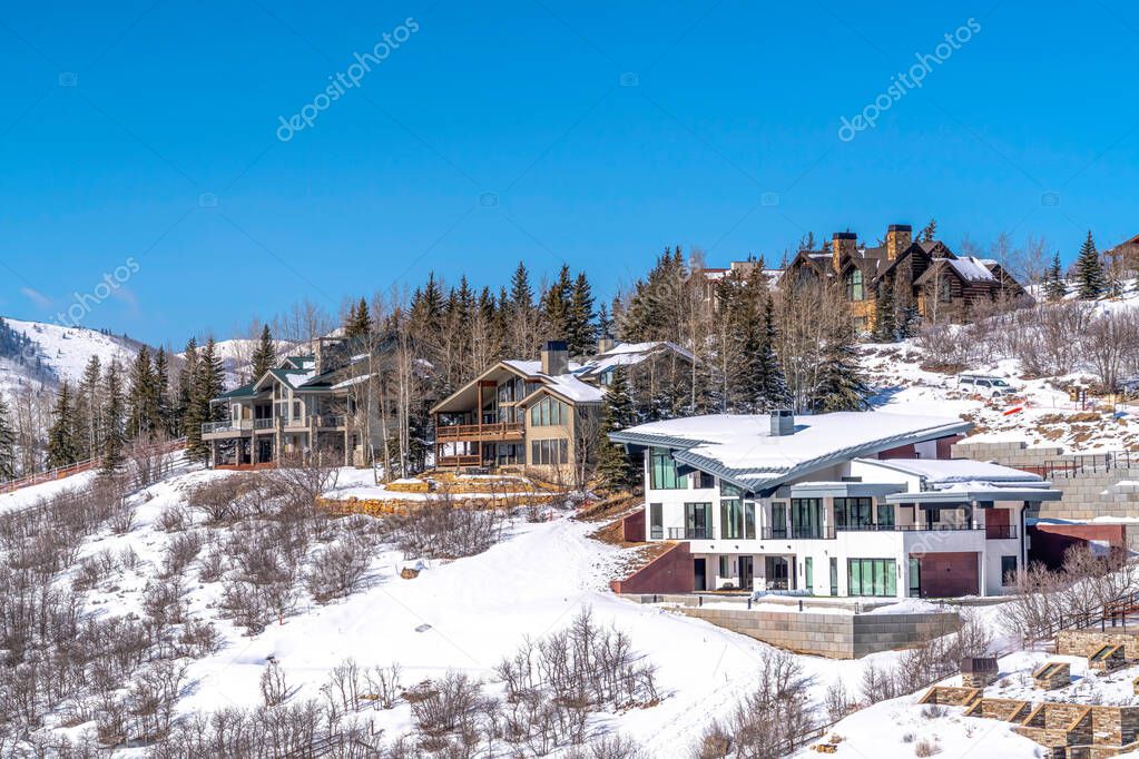 Homes on a snow covered mountain neighborhood in Park City Utah in winter
