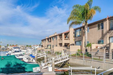 Waterfront houses overlooking the harbour in sunny Huntington Beach California