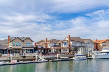Seaside views at a harbour in Huntington Beach California with waterfront homes