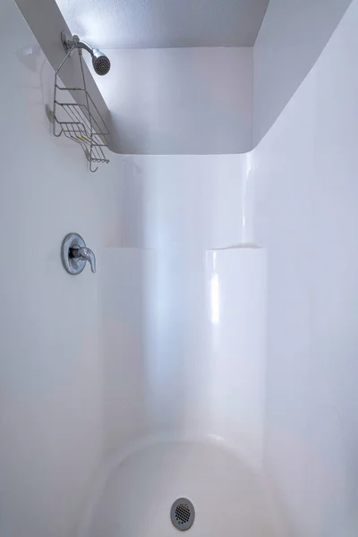 Shower area with a knob and rack under the shower head. — Stock Photo, Image