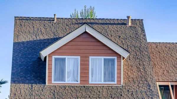 Pano Home facade in San Diego California with dormers and garage against blue sky — Fotografia de Stock