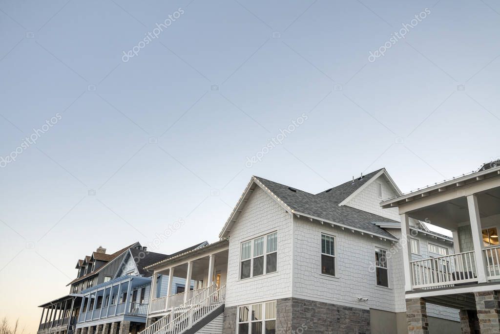 Low angle view of large residential houses against the clear sky view