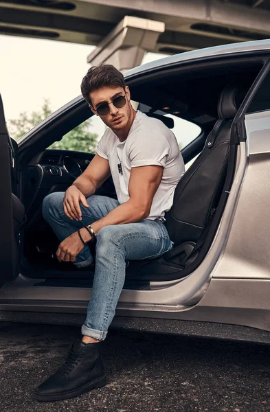 Handsome Young Man Sunglasses Casual Clothes Sitting His Modern Sport — Stock Photo, Image