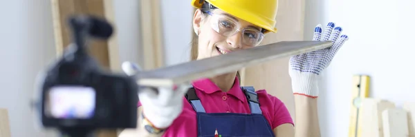 Builder blogger shoots apartment renovation tips closeup