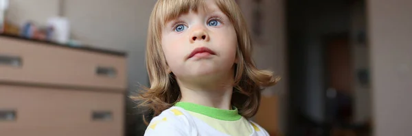 Cute little girl standing in her room at home — Stock Photo, Image