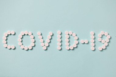 Yazıt covid 19 beyaz haplardan yapılmış.