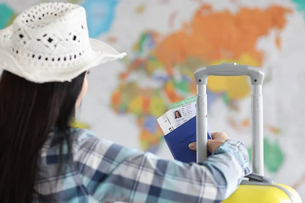 Woman holds in her hands passport with vaccine against coronavirus infection — Stock Photo, Image