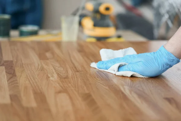 Apply wood care oil to product closeup — Stock Photo, Image