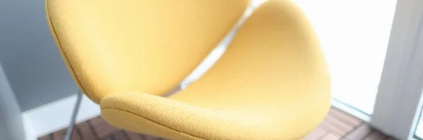 Yellow modern stylish armchair stands indoors closeup — Stock Photo, Image