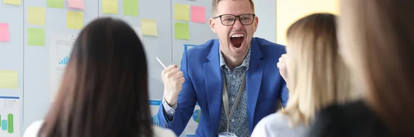 Business coach teaching emotionally yells at employees