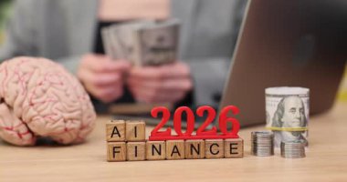 Dinamik bir ortamda, birisi 2026 yılındaki gelişmeleri öngören yapay zeka ve finans kavşağını göstermek için para, sikke ve beyin görüntülerini birleştirir..