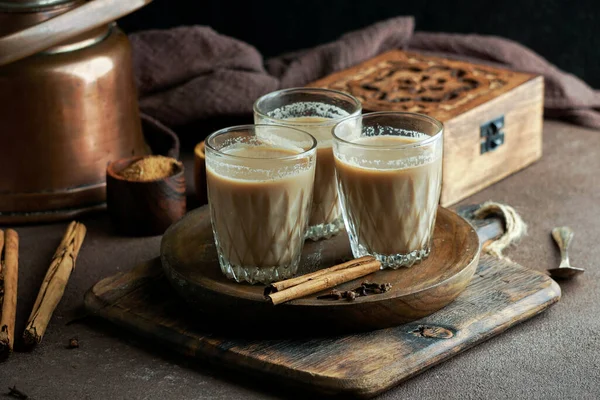 indian spicy tea masala, hot and delicious traditional drink of tea, milk and spices