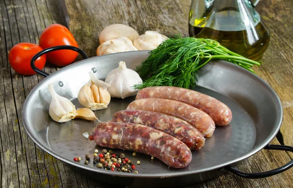 Homemade raw sausages - chicken and beef sausages with garlic and spices