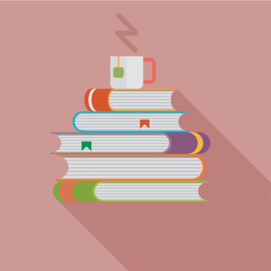 Bir fincan ile kitap yığını
