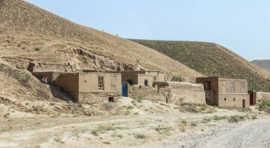 Bedir 'de günlük mülteci köyü hayatı, Afganistan' da çölde..