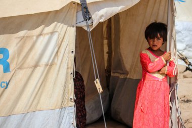 Bedir 'de günlük mülteci köyü hayatı, Afganistan' da çölde..