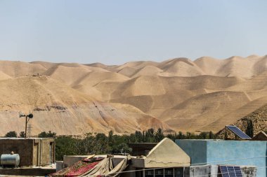 Bedir 'de günlük mülteci köyü hayatı, Afganistan' da çölde..