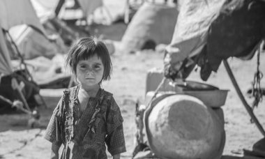 Bedir 'de günlük mülteci köyü hayatı, Afganistan' da çölde..