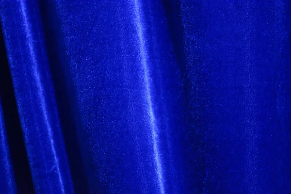 Blue velvet fabric in pleats — Stock Photo, Image