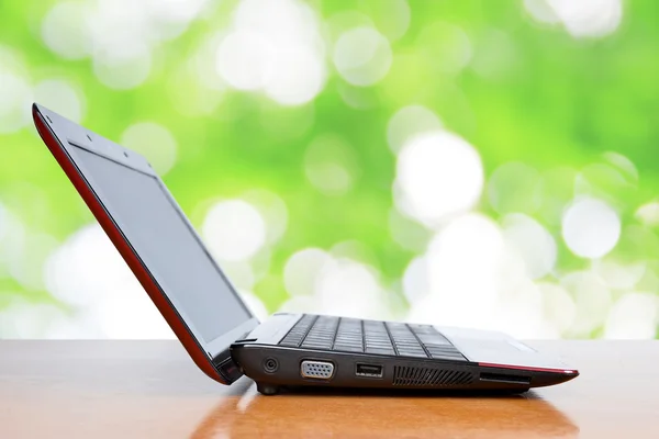 Open laptop on table — Stock Photo, Image