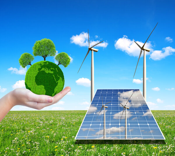 Солнечные батареи с ветряными турбинами и зеленой планетой в руке
. 