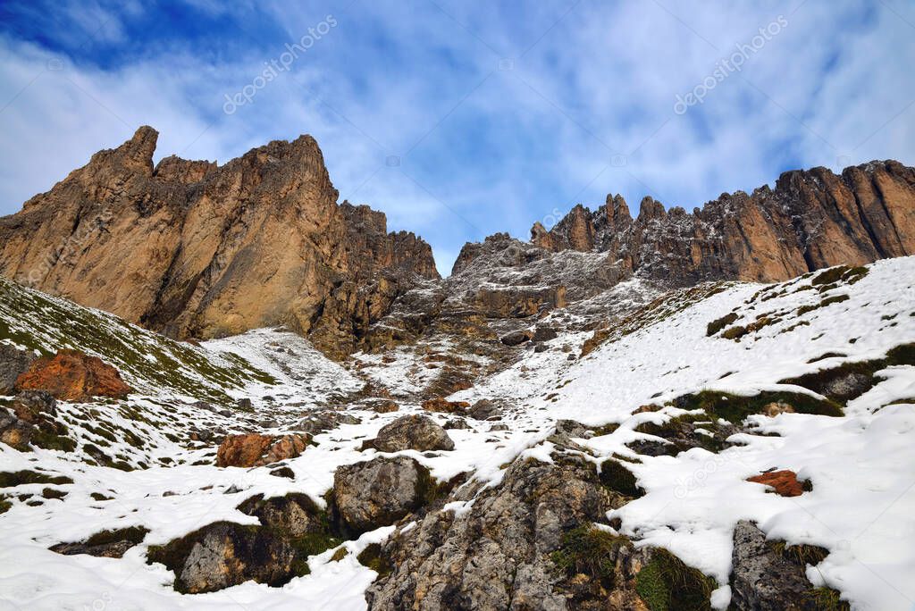 Mountain group Sassolungo (Langkofel). Beautiful snowy winter landscape in Dolomites. Province of Trento, South Tyrol, Italy.
