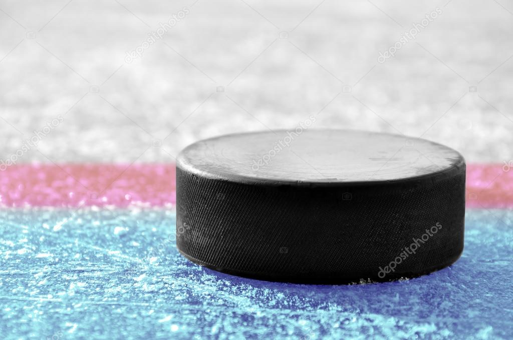 Black hockey puck — Stock Photo © vencav 55297437