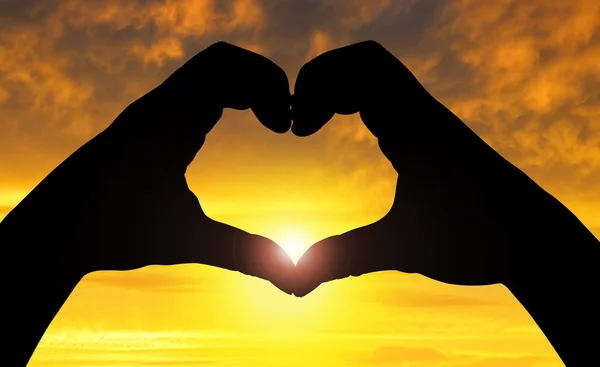 Silhouette hands in the form of heart — Stock Photo, Image