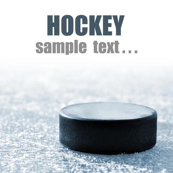 Black hockey puck — Stock Photo, Image