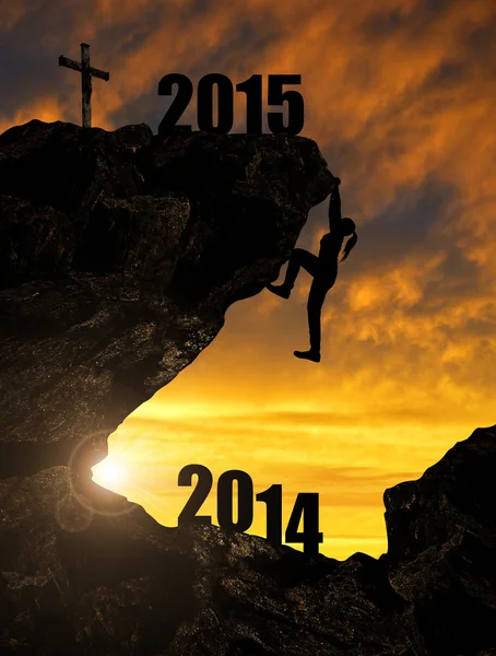 Dziewczyna wspina się na nowy rok 2015 — Zdjęcie stockowe