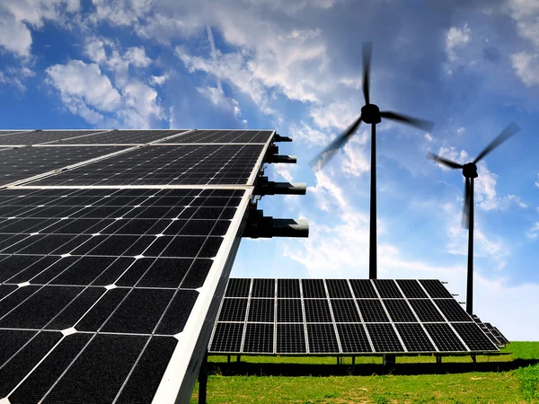 Solar energy panels with wind turbines — Stock Photo, Image