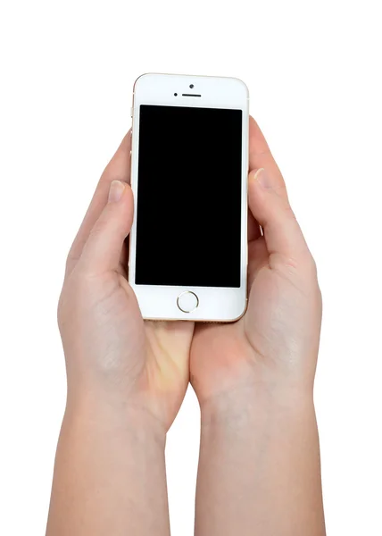 Frau hält Apple iphone 5s Smartphone in den Händen — Stockfoto