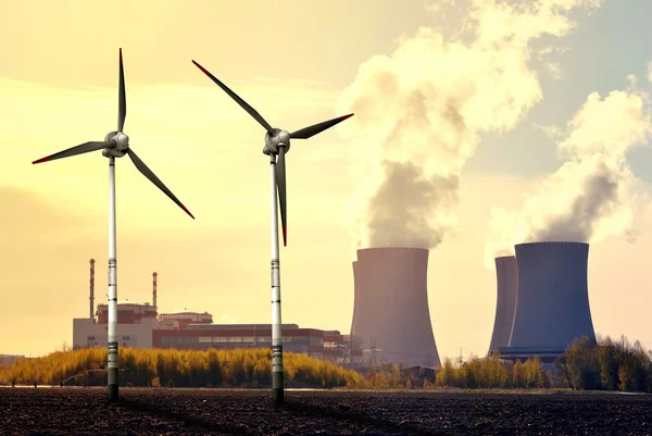 Nuclear power plant and wind turbines — Stock Photo, Image