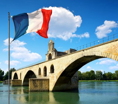 Pont Saint-Benezet with French flag in Avignon clipart