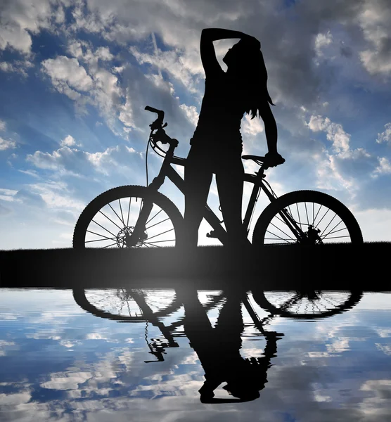 Menina em uma bicicleta — Fotografia de Stock