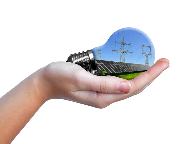 Hand holding eco light bulb — Stock Photo, Image