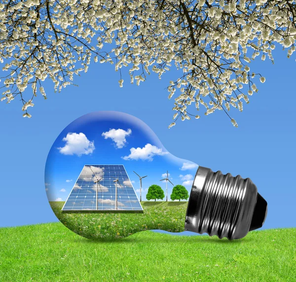 Solar panels and wind turbines in light bulb — Stock Photo, Image