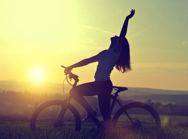 Girl with bicycle — Stock Photo, Image