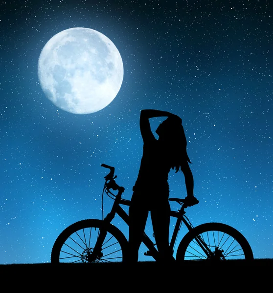 Girl on a bicycle — Stock Photo, Image