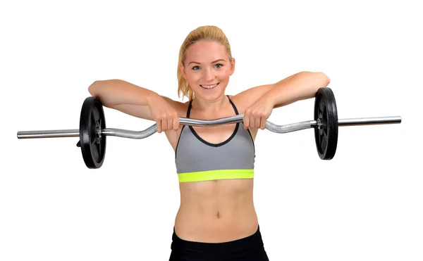 Girl exercise shoulder muscles with dumbbell — Stock Photo, Image