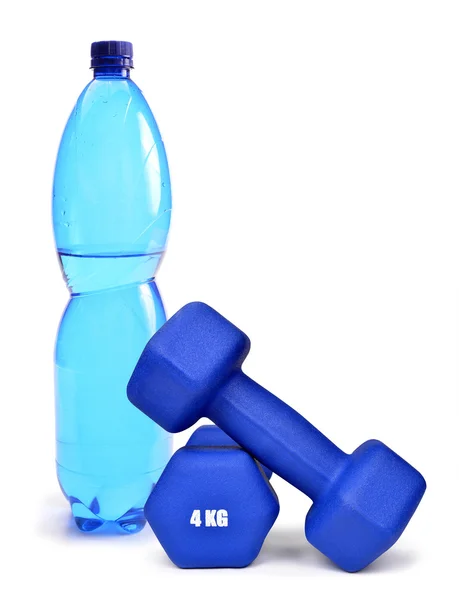 Blue fitness dumbbells and PET bottle with drinking water — Stock Photo, Image