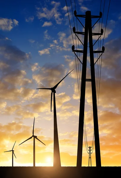 High voltage tower and wind turbines — Stock Photo, Image